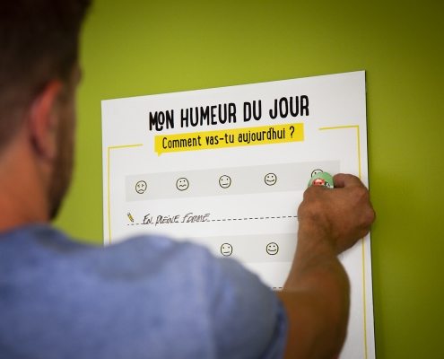 Individu indique son humeur sur un outil collaboratif